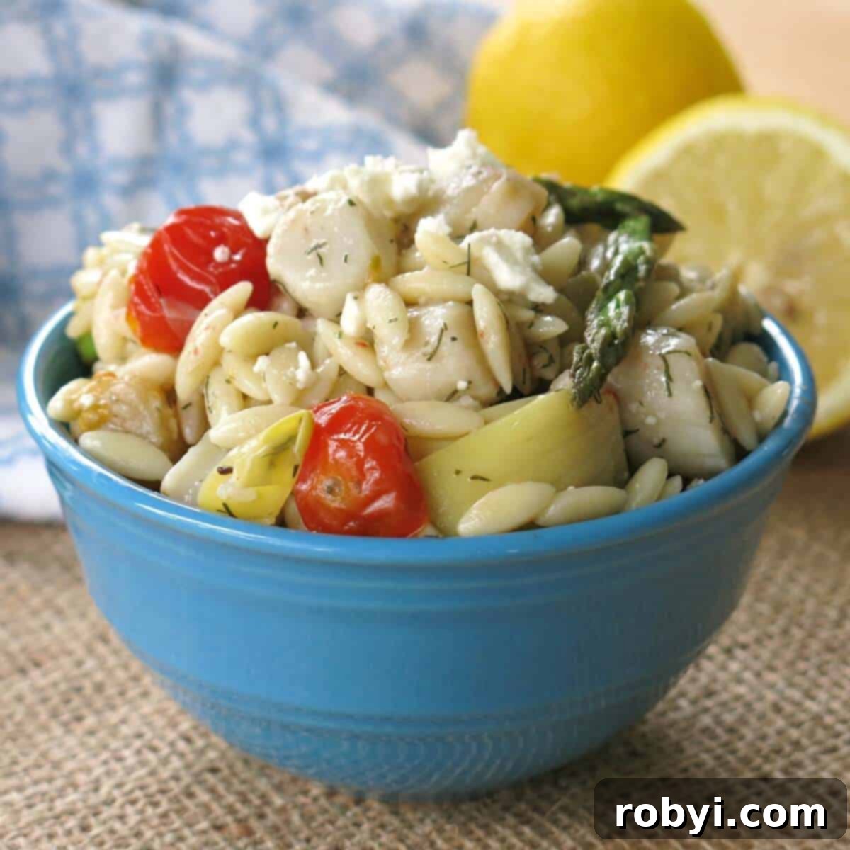 Pan-Seared Scallops over Warm Orzo with Marinated Artichokes and Feta 1 featured 4124