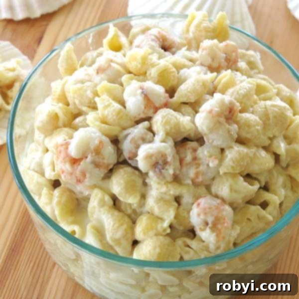 Elevated Shrimp Mac and Cheese 3 Large glass bowl with Shrimp Mac and Cheese Recipe in it, ready to serve