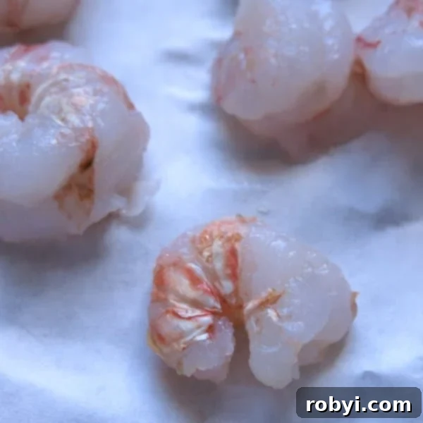 Elevated Shrimp Mac and Cheese 4 Raw rock shrimp that is peeled and deveined, ready for cooking