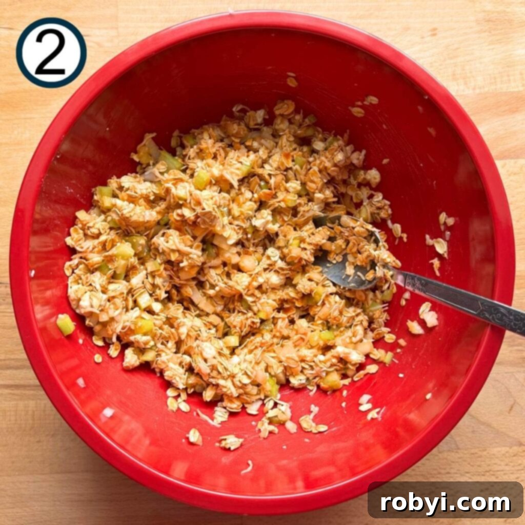 Buffalo sauce and egg mixed into dry ingredients.