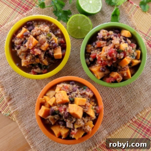Three individual bowls of Sweet Potato Black Bean Chili with Quinoa, accompanied by fresh lime wedges.