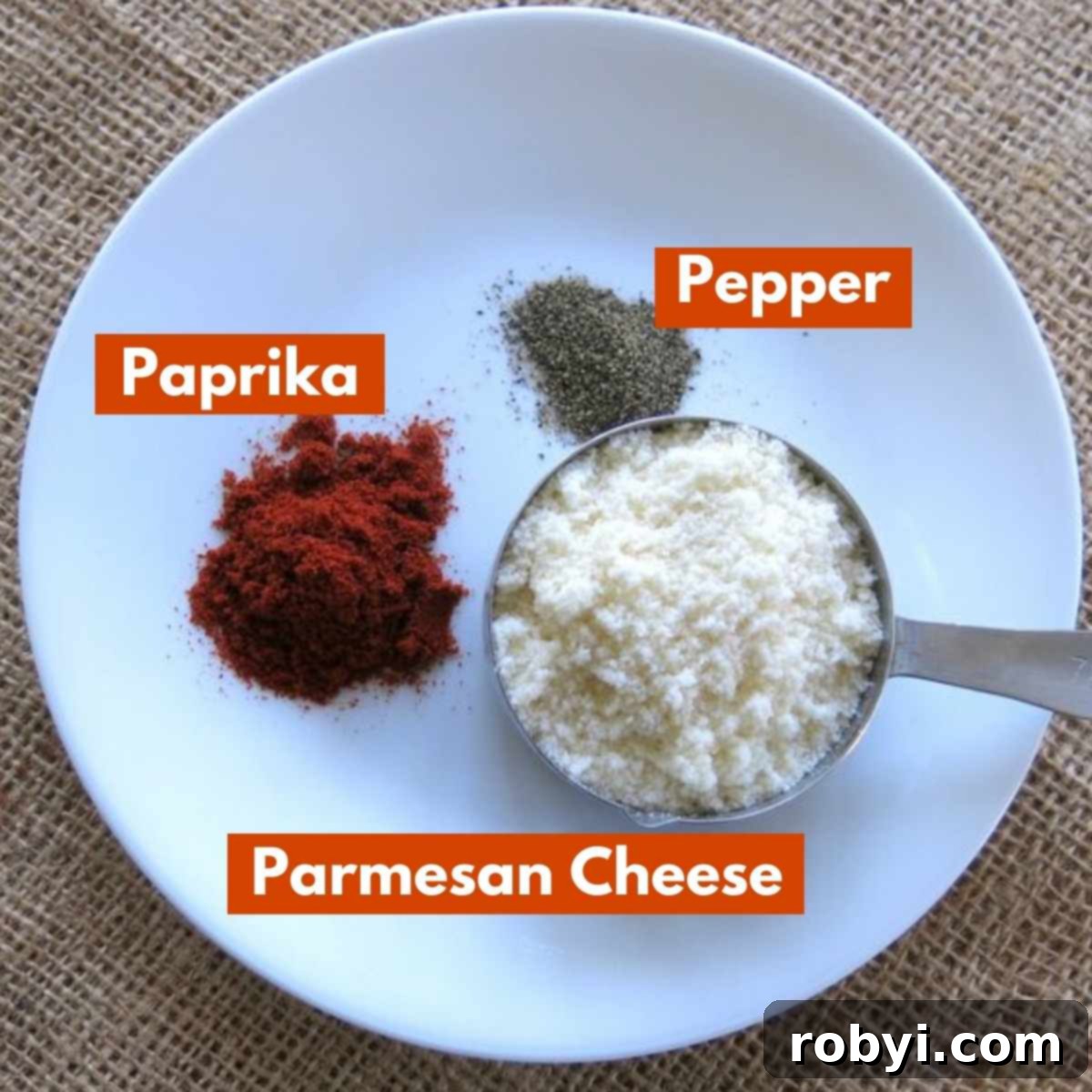 5-Ingredient Parmesan Cauliflower Poppers 4 A graphic illustrating the simple breading ingredients: Parmesan cheese, paprika, and black pepper, neatly labeled.