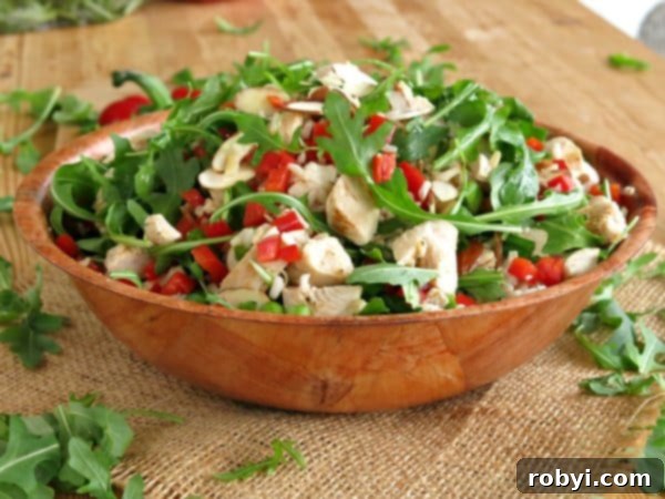Arugula Rice Salad with Chicken in a bowl