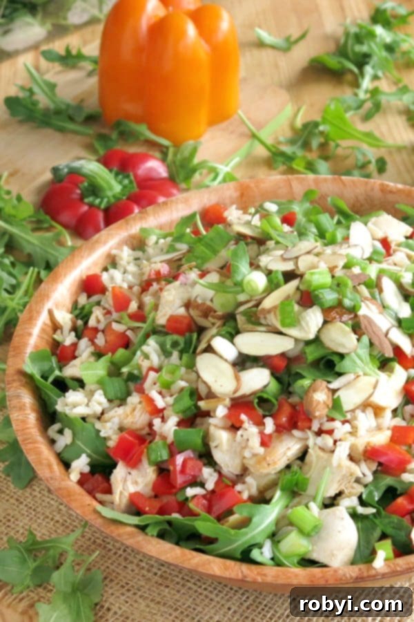 Chicken Arugula Rice Salad Recipe in a bowl.