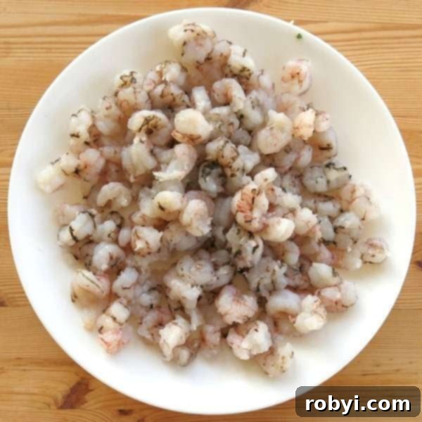 Picture of peeled and deveined rock shrimp, ready for cooking.