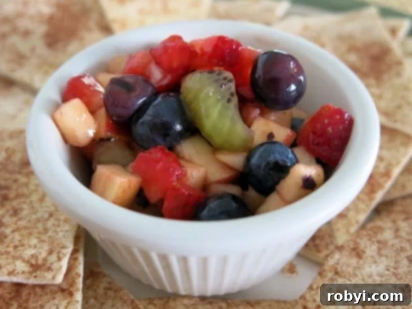 Fruit Salsa in single serve bowl with Cinnamon Chips around it