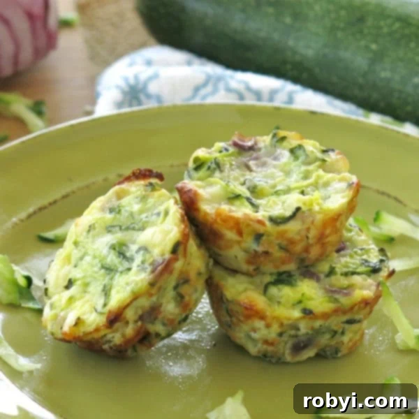 Three zucchini and Egg Muffins on plate