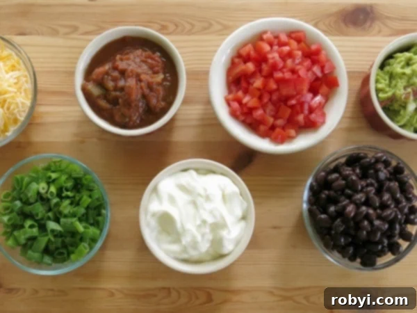 A variety of Mexican toppings in small bowls.
