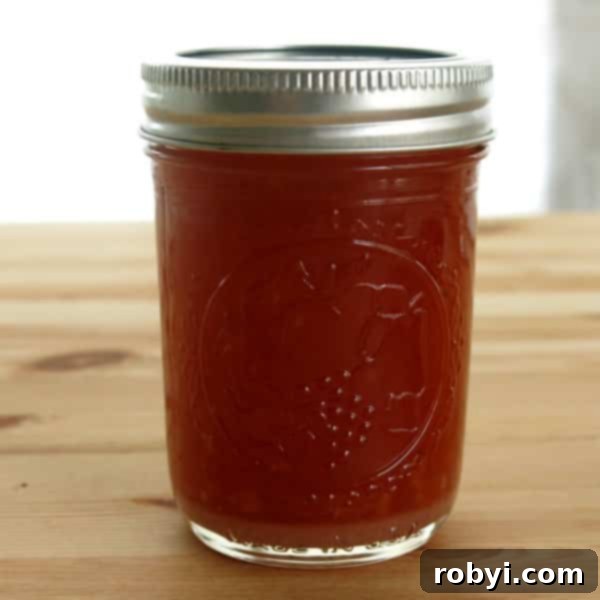 The Ultimate Oven-Baked London Broil 4 Homemade marinade in a small mason jar, ready for use.