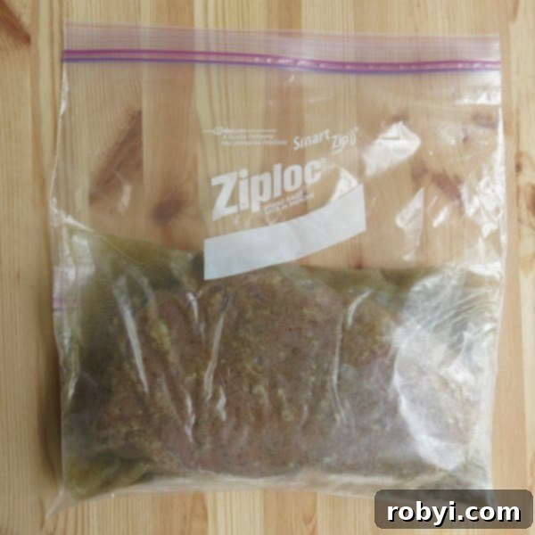 The Ultimate Oven-Baked London Broil 7 London Broil marinating in a plastic bag, ready for the freezer or refrigerator.