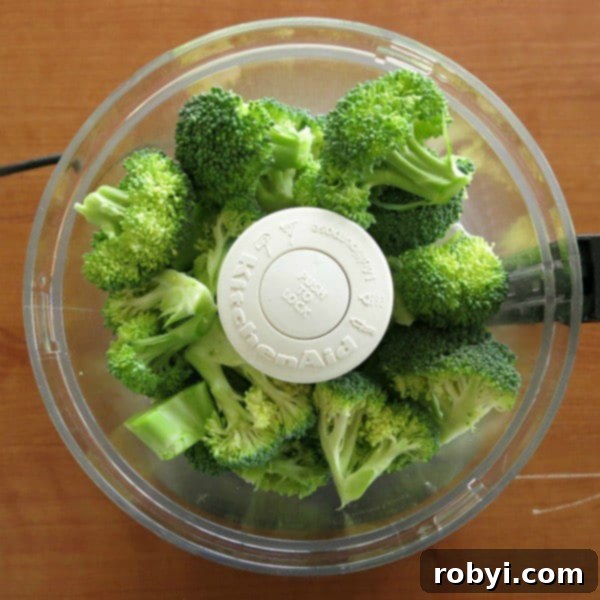 Broccoli florets in a food processor