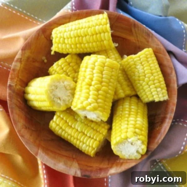 Lock in Flavor: Freezing Corn on the Cob, Husk Included 5 Segments of Corn on the Cob cooked in the microwave in a bowl