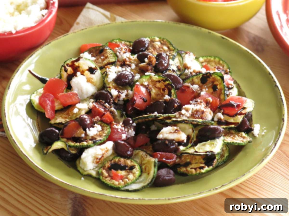 Low-carb zucchini chip nachos on a plate.