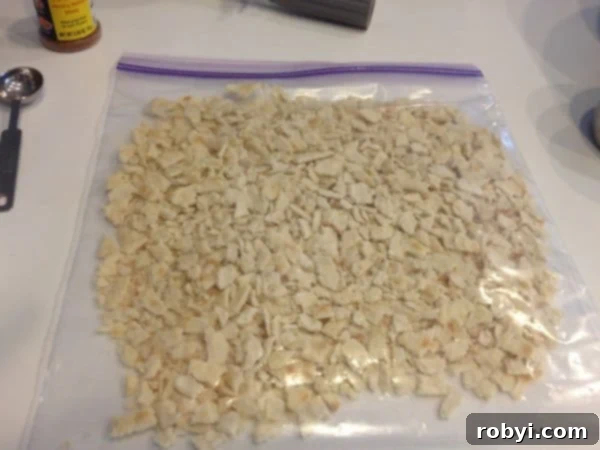 Crushed Saltine Crackers in a plastic bag.