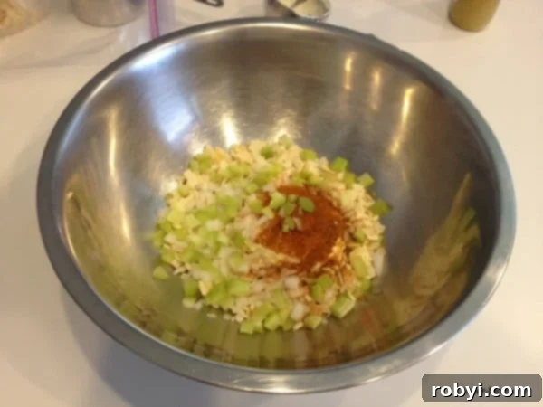Ingredients for Crab Cakes in bowl, but not combined.
