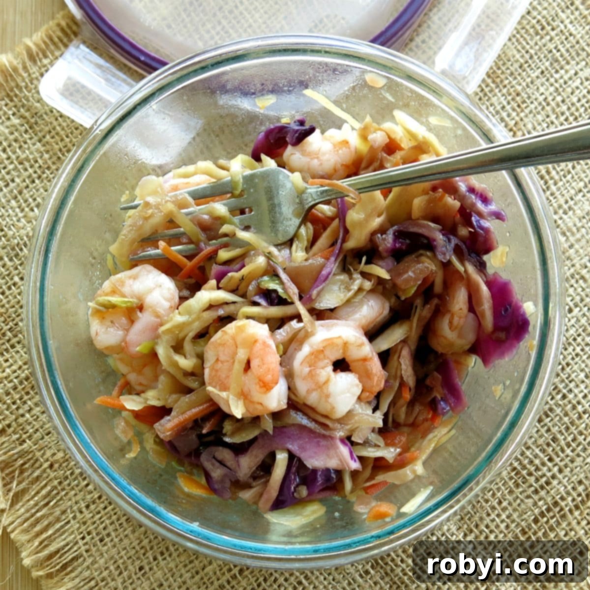 Shrimp Egg Roll Bowl perfectly portioned in a meal prep container, ready for a healthy lunch.