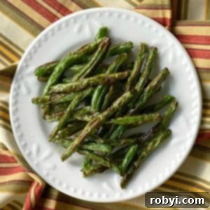 Crispy Roasted Green Beans on a plate.