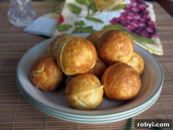 Beyond Cake Pops: 3 Unexpected Maker Ideas 4 Delicious pizza bites cooked in a cake pop maker, garnished with herbs