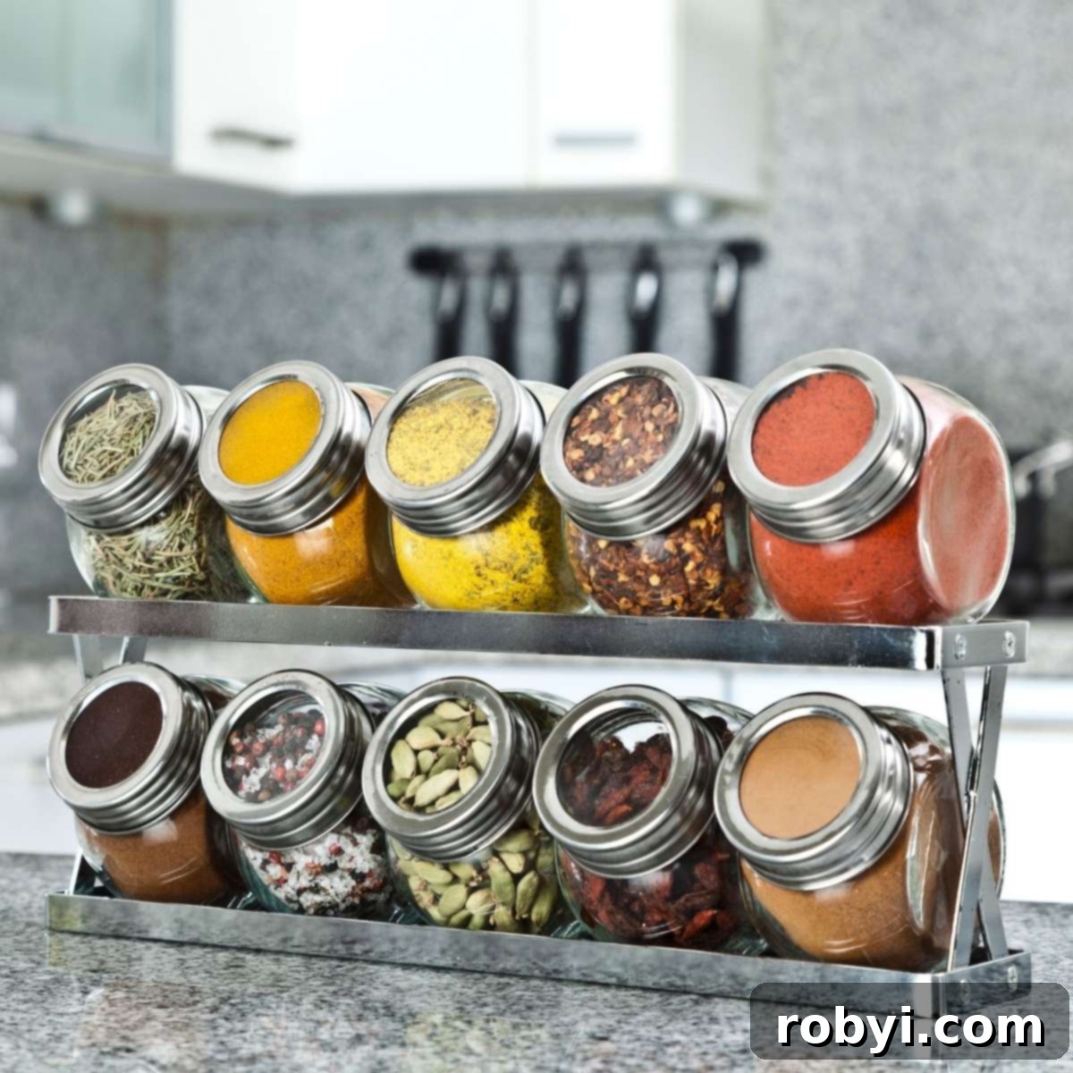 An immaculately organized spice rack, showcasing various spices in uniform jars, ready for use in a clean cabinet or on a kitchen counter.