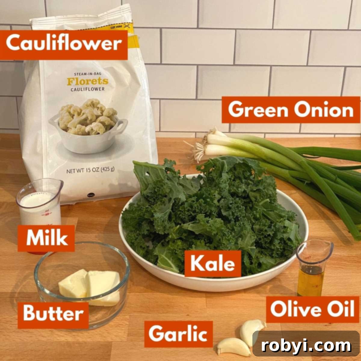 Graphic with ingredients to make cauliflower colcannon recipe: cauliflower floriets, kale, spring onions, milk, butter, olive oil, and garlic.