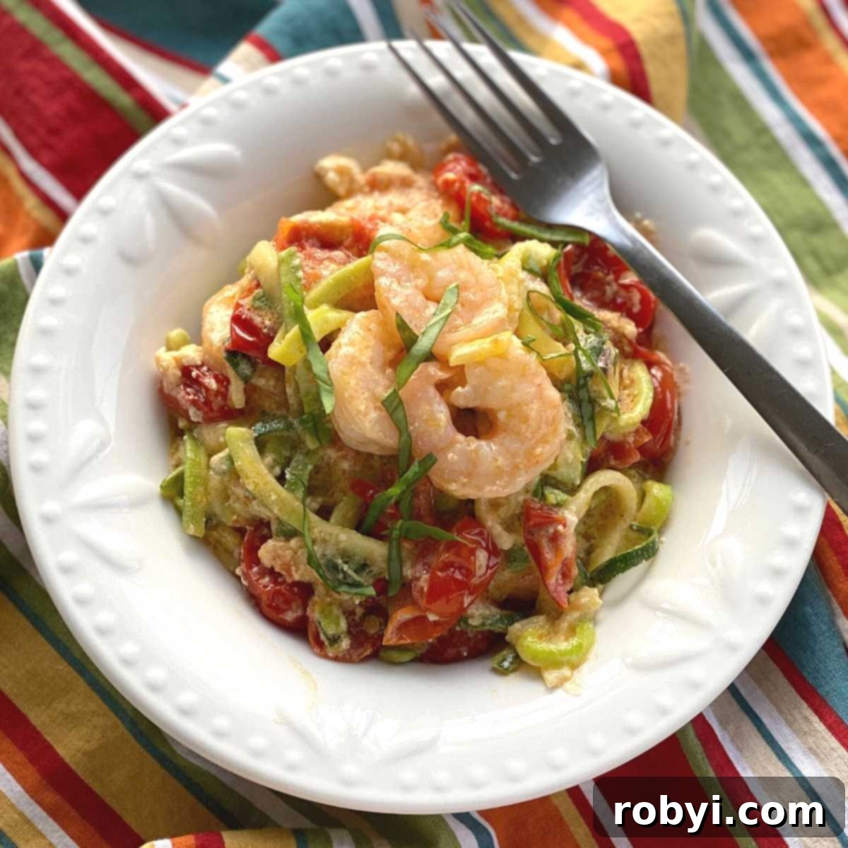 Creamy Baked Feta Shrimp with Zucchini Noodles 2 Viral Tik Tok Baked Feta Zoodles and Shrimp in a bowl with a fork.