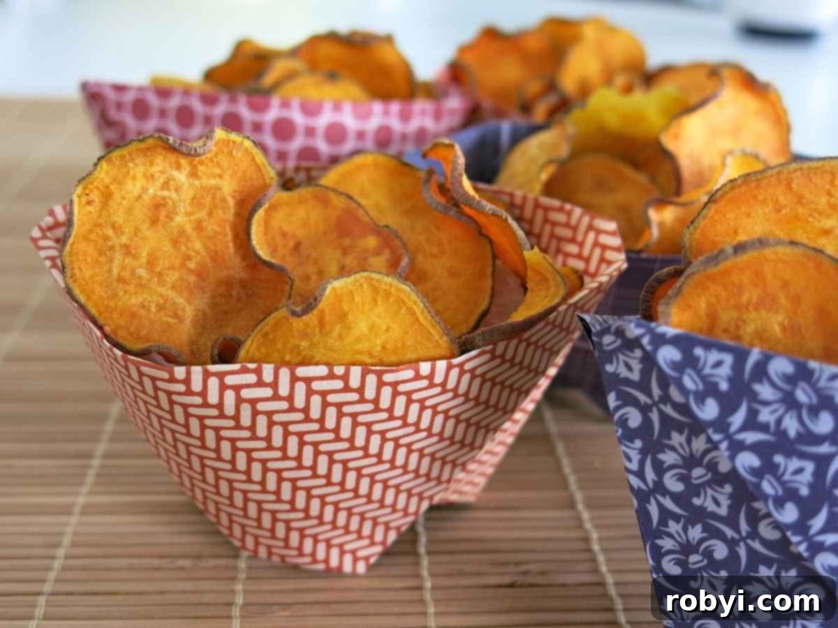 Sweet potato chips in a paper serving container.