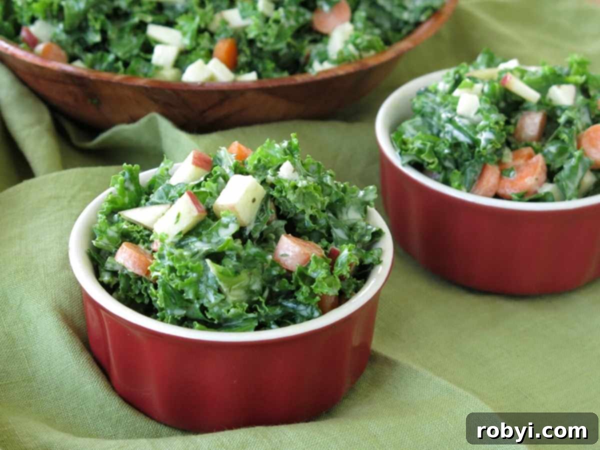Kale apple slaw in a serving cups.
