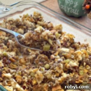 Prep-Ahead Oven Stuffing 7 Make-ahead Oven Baked Stuffing with fresh bread, apples, and pecans, showcased in a casserole dish.
