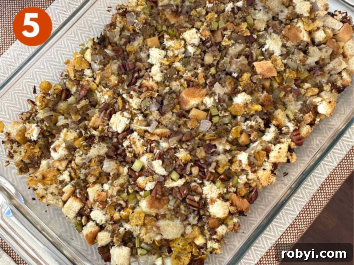 Prep-Ahead Oven Stuffing 6 A beautiful baking dish filled with homemade stuffing, perfectly cooked to a golden brown on top and ready to be served.