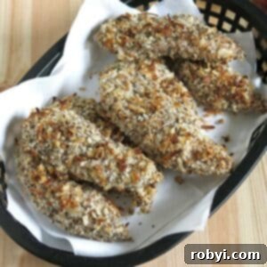 Easy baked chicken tenders with a healthy panko breading in a basket.