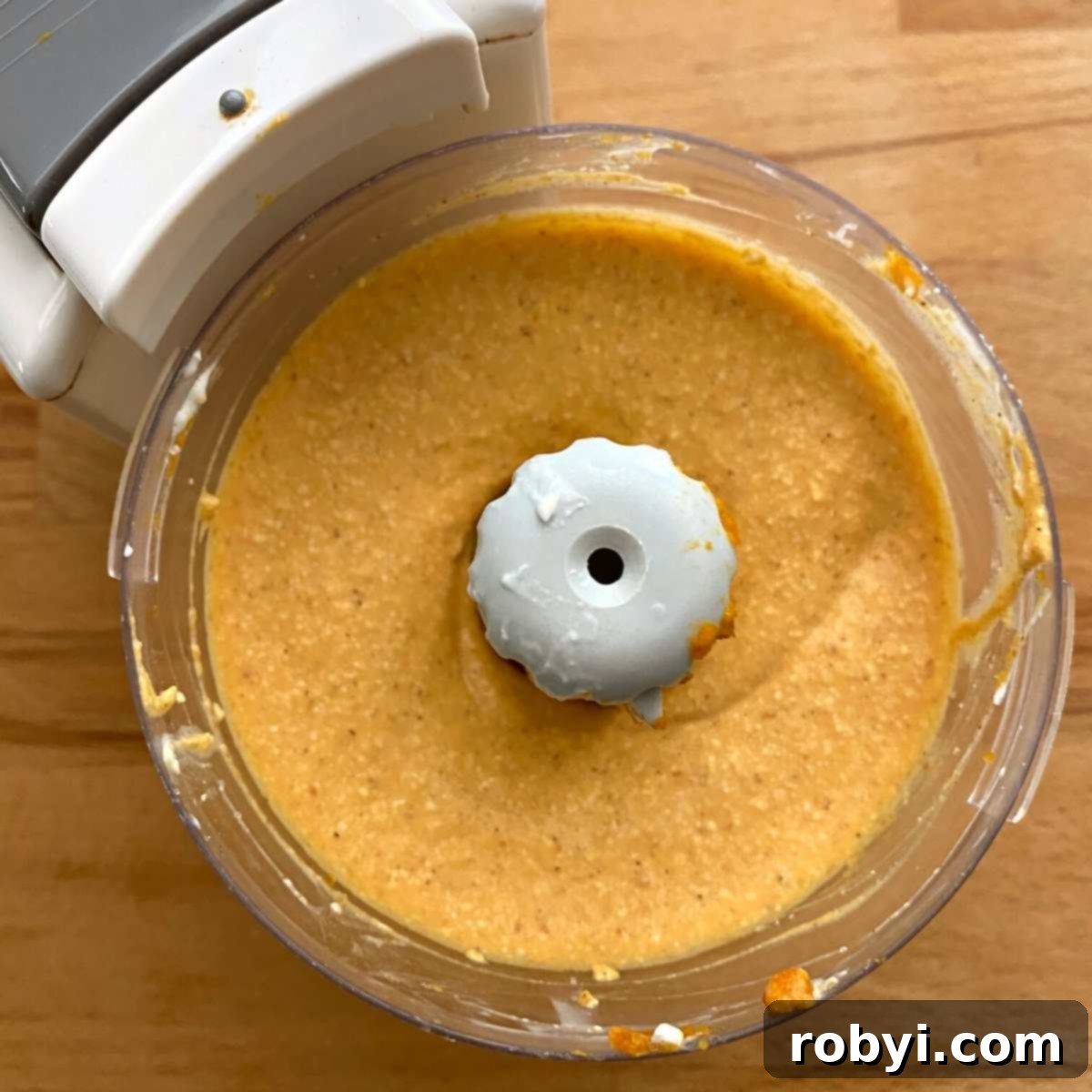 All ingredients for whipped pumpkin cottage cheese in a small food processor bowl before blending.