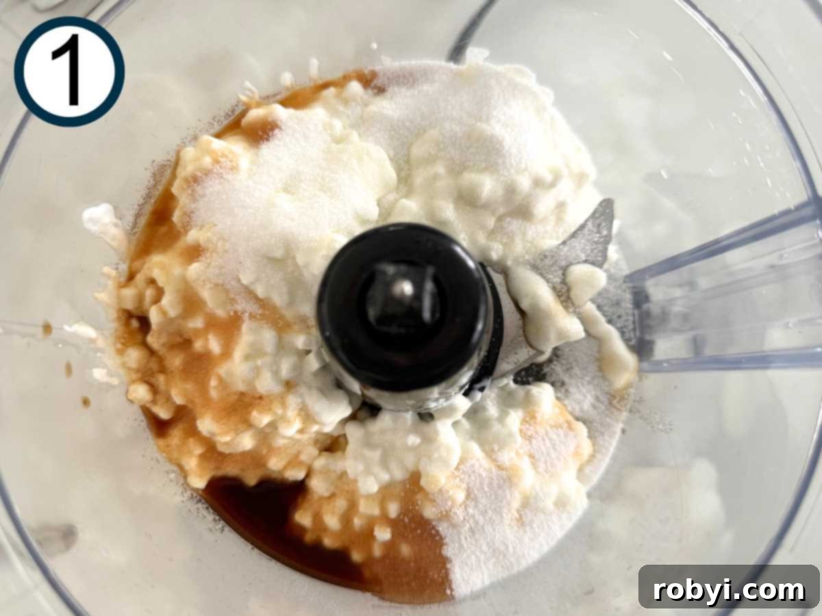 Cottage cheese, vanilla extract, Stevia sugar blend in the base of a food processor.