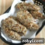 Easy baked chicken tenders with a healthy panko breading in a basket.