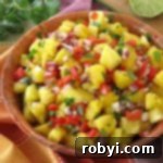 Easy Pineapple Salsa in a large wooden bowl.
