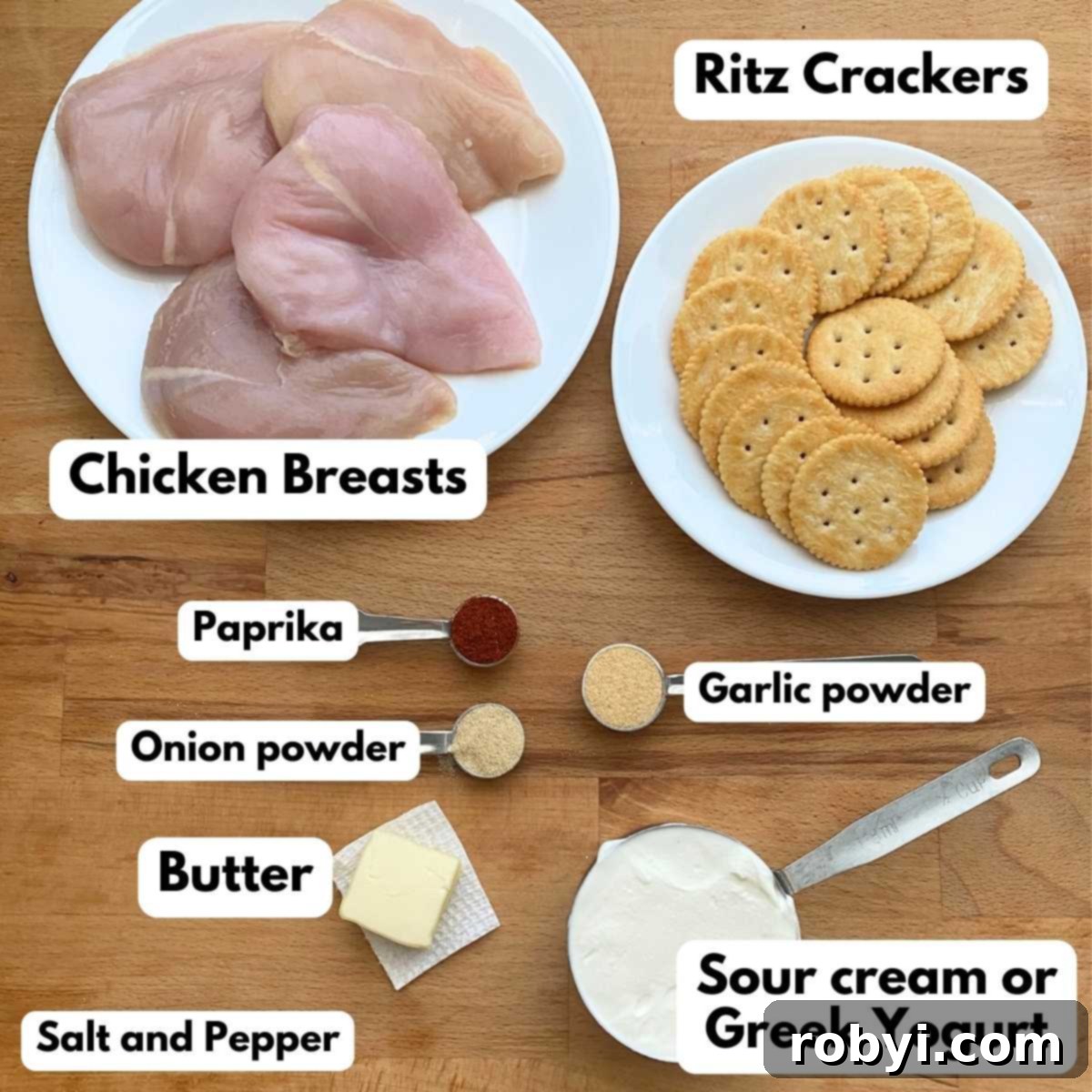 Crispy Ritz Cracker Chicken Perfection 3 Labeled ingredients to make heavenly chicken: chicken breasts, Ritz crackers, sour cream, paprika, onion powder, garlic powder, butter.