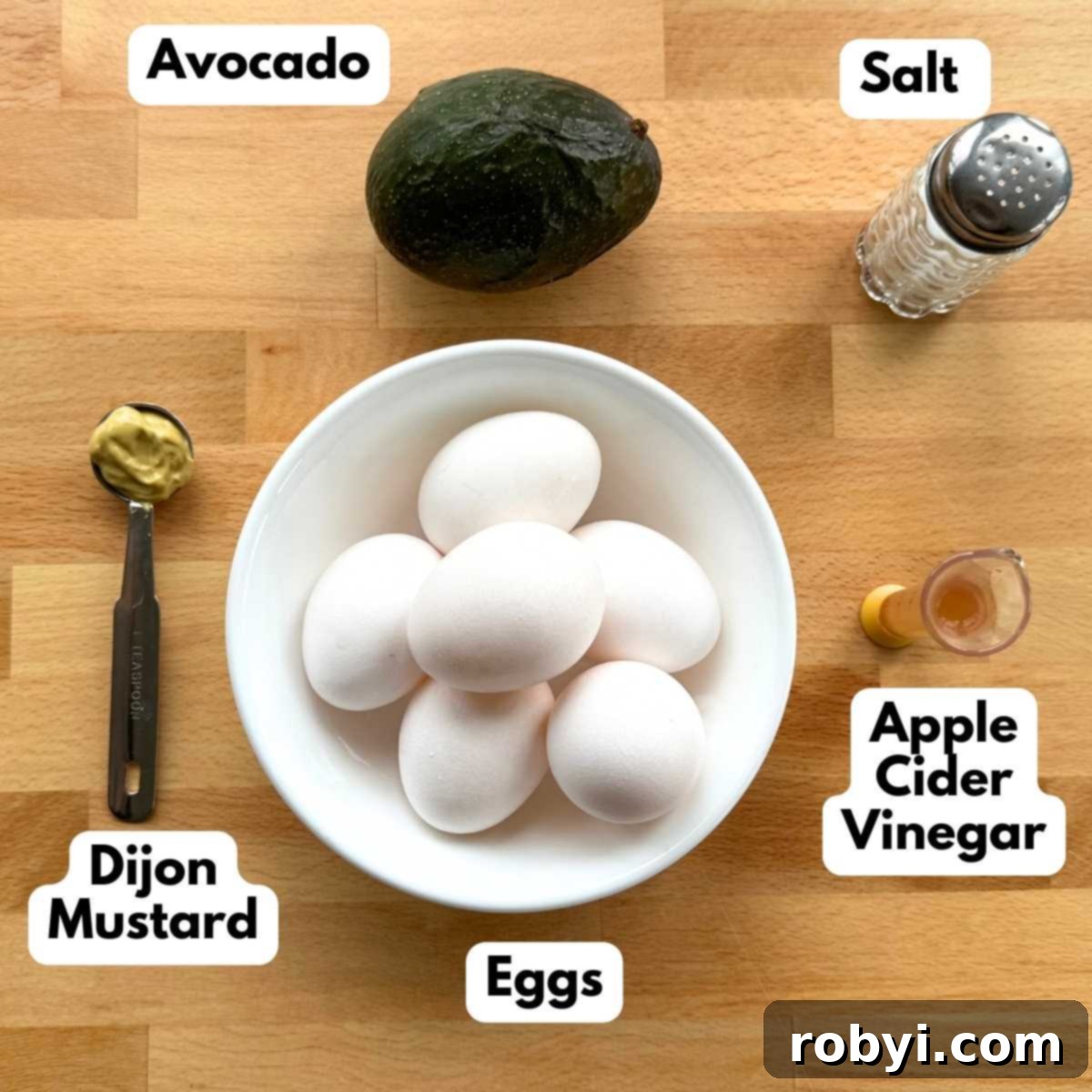 Bright and Light Egg Salad 3 Collage of ingredients to make healthy egg salad: 6 eggs, avocado, Dijon mustard, apple cider vinegar, salt.