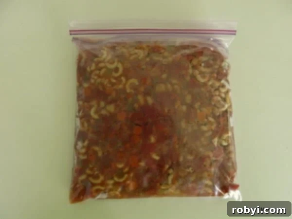 Copycat Olive Garden Pasta Fagioli Soup 4 Close-up of hearty Pasta Fagioli soup with pasta and beans visible.