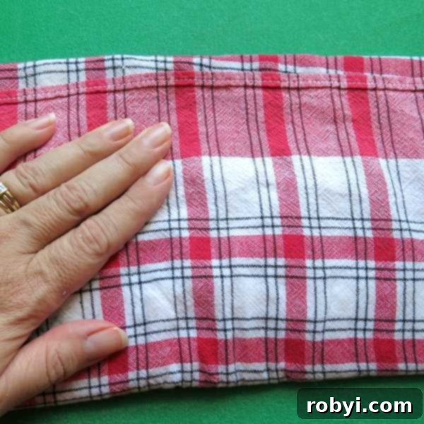 Healthy Cauliflower Pizza: Bites or Crispy Crust 5 Squeezed cooked cauliflower rice for cauliflower pizza dough, showing reduced moisture.