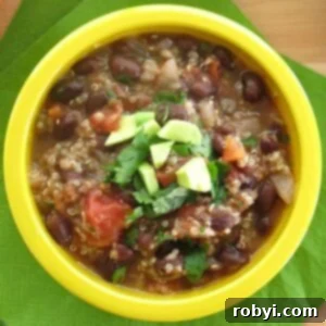 Quick & Hearty Black Bean Quinoa Soup 4 Easy Black Bean Quinoa Soup Recipe in a bowl topped with avocado and cilantro