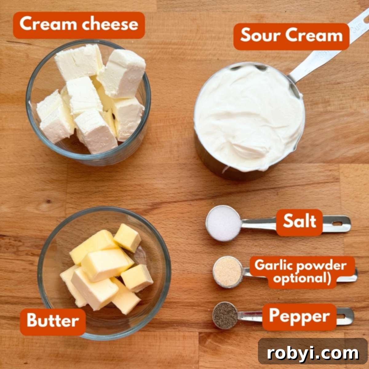 Cream cheese cubes, sour cream, butter cubes, salt, pepper, and garlic powder to make mashed potatoes.