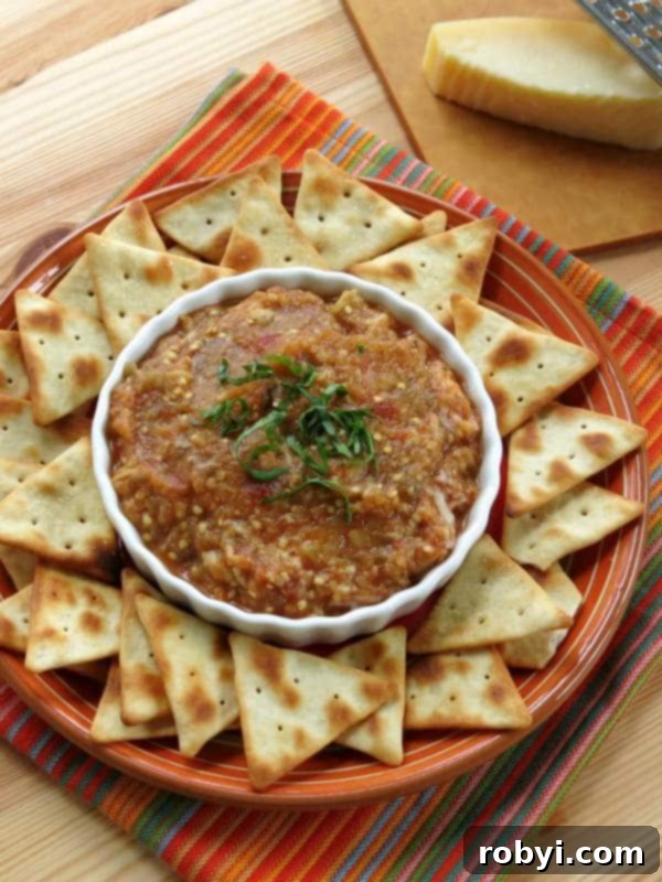 Roasted Eggplant Parmesan Dip Recipe - No Tahini! Creamy, cheesy, and savory Italian dip perfect for appetizers.