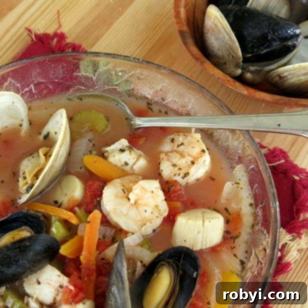 Seafood Cioppino Stew in bowl with spoon