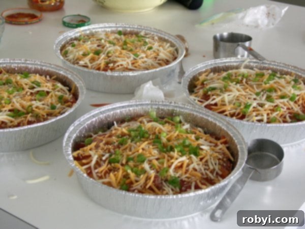 Fiesta Layered Burrito Bake 5 4 pans of Stacked Burrito Pie ready to go into the freezer