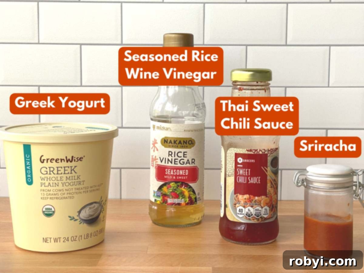 Ingredients to make healthy bang bang sauce: Greek yogurt, Thai sweet chili sauce, seasoned rice vinegar, and sriracha.