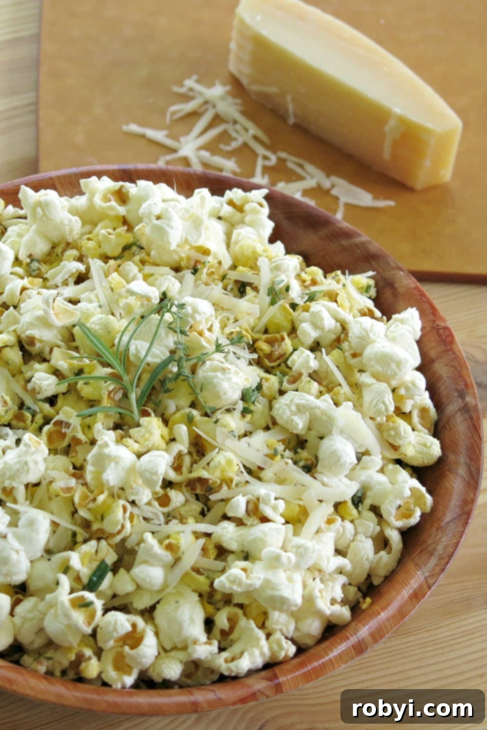 Big bowl of Savory Popcorn Recipe with Parmesan Cheese and Fresh Herbs.