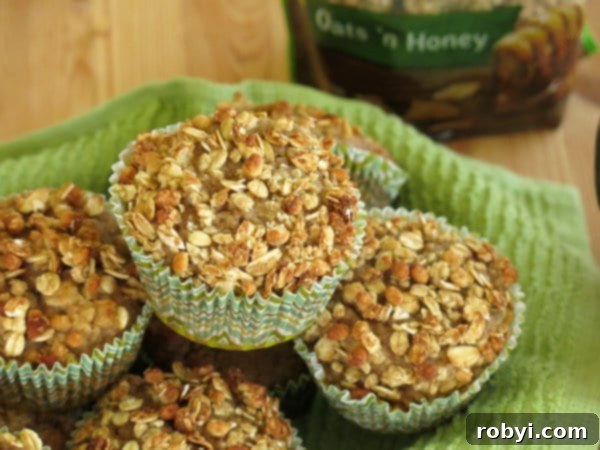 Easy Applesauce Muffins with a Crunchy Granola Topping.