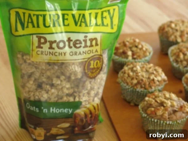 Easy Applesauce Muffins with a Crunchy Granola Topping.