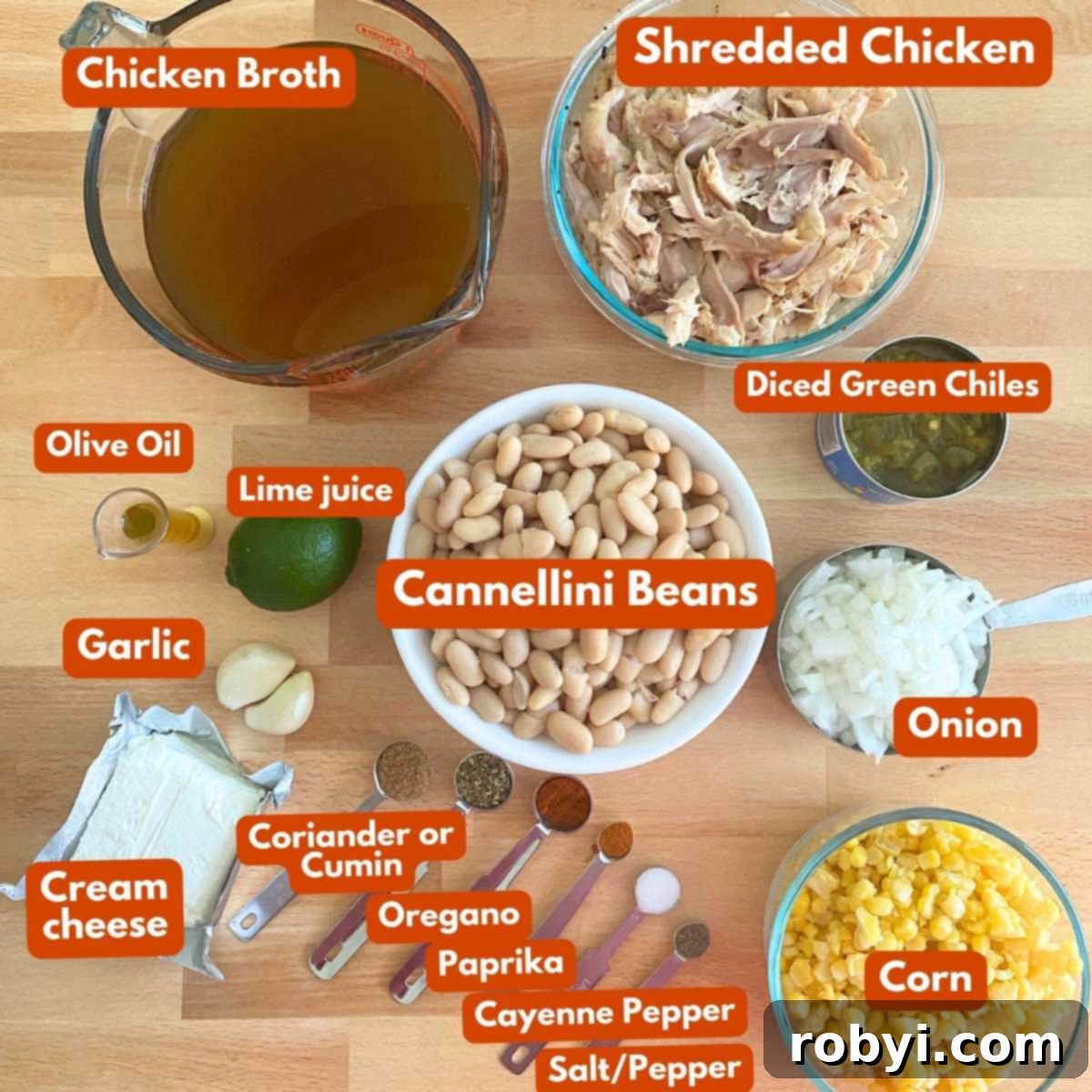 Cream Cheese Dream White Chicken Chili 3 Labeled ingredients to make white chicken chili: Broth, shredded chicken, cannellini beans, diced green chiles, cream cheese, onion, corn, spices, lime juice, garlic, and olive oil.