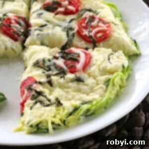 Naked Zucchini Noodle Tart 9 Slices of crustless zucchini pie made with spiralized zucchini noodles on a white plate, ready to be served.