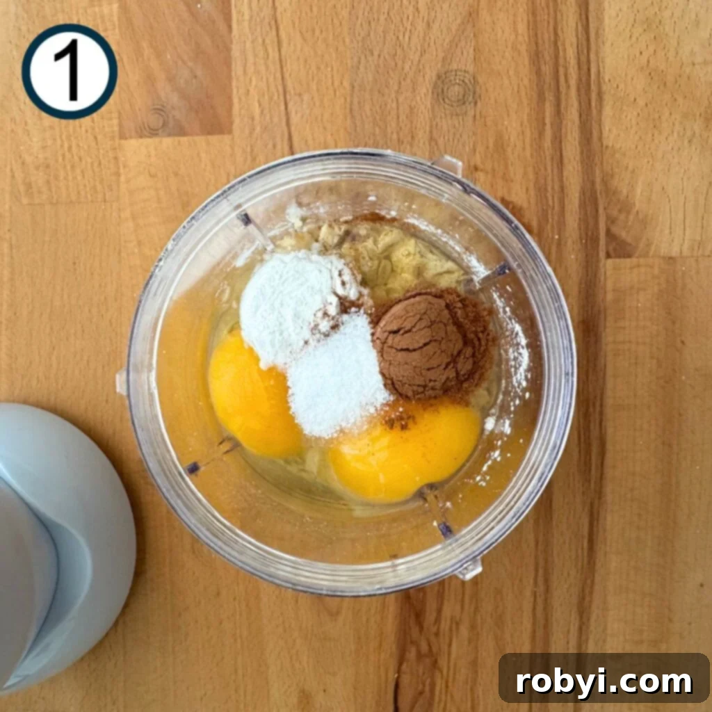 Oats, cottage cheese, eggs, baking powder, and cinnamon in a blender